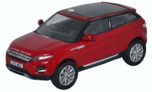 N - Scale Model Train Layout with a City - Themed Background and Animated FiguresOxford Diecast Range Rover Evoque Firenze Red